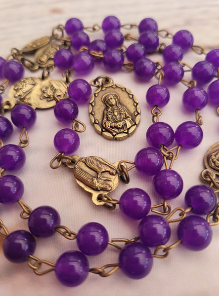 Purple seven sorrows delour rosary close up