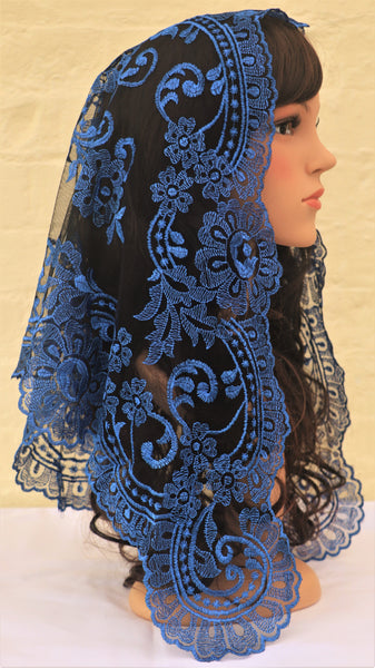 Beautiful Catholic Di Clara traditional blue embroidered lace mantilla chapel veil, side view. Brown hair.